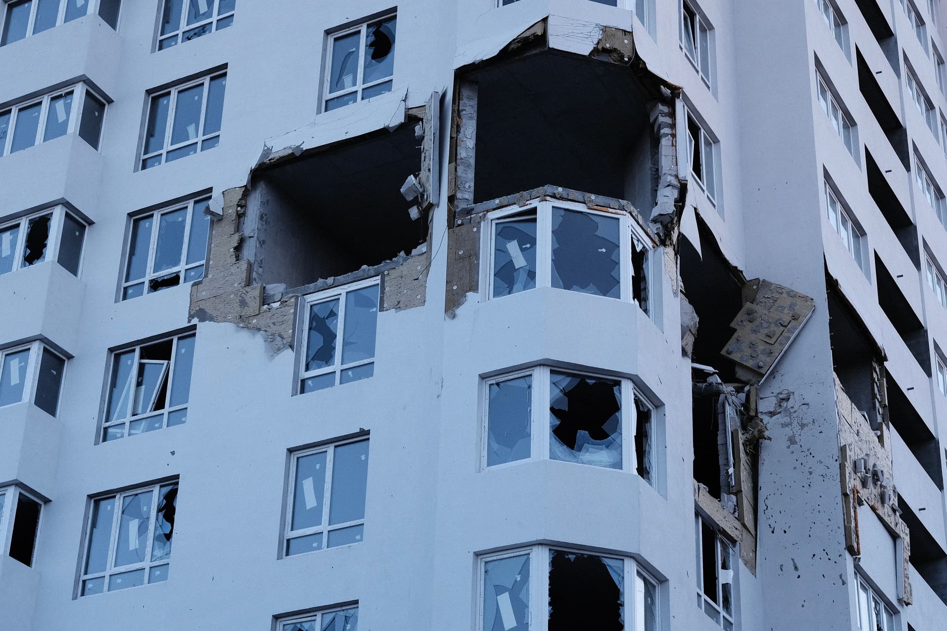 Damaged building illustrating structural vulnerability to conflict